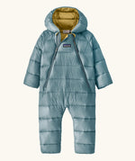 Patagonia little kids hi -loft down sweater bunting snow suit in sage blue with yellow inner liner. A all in one with a double front zip and a padded hood 