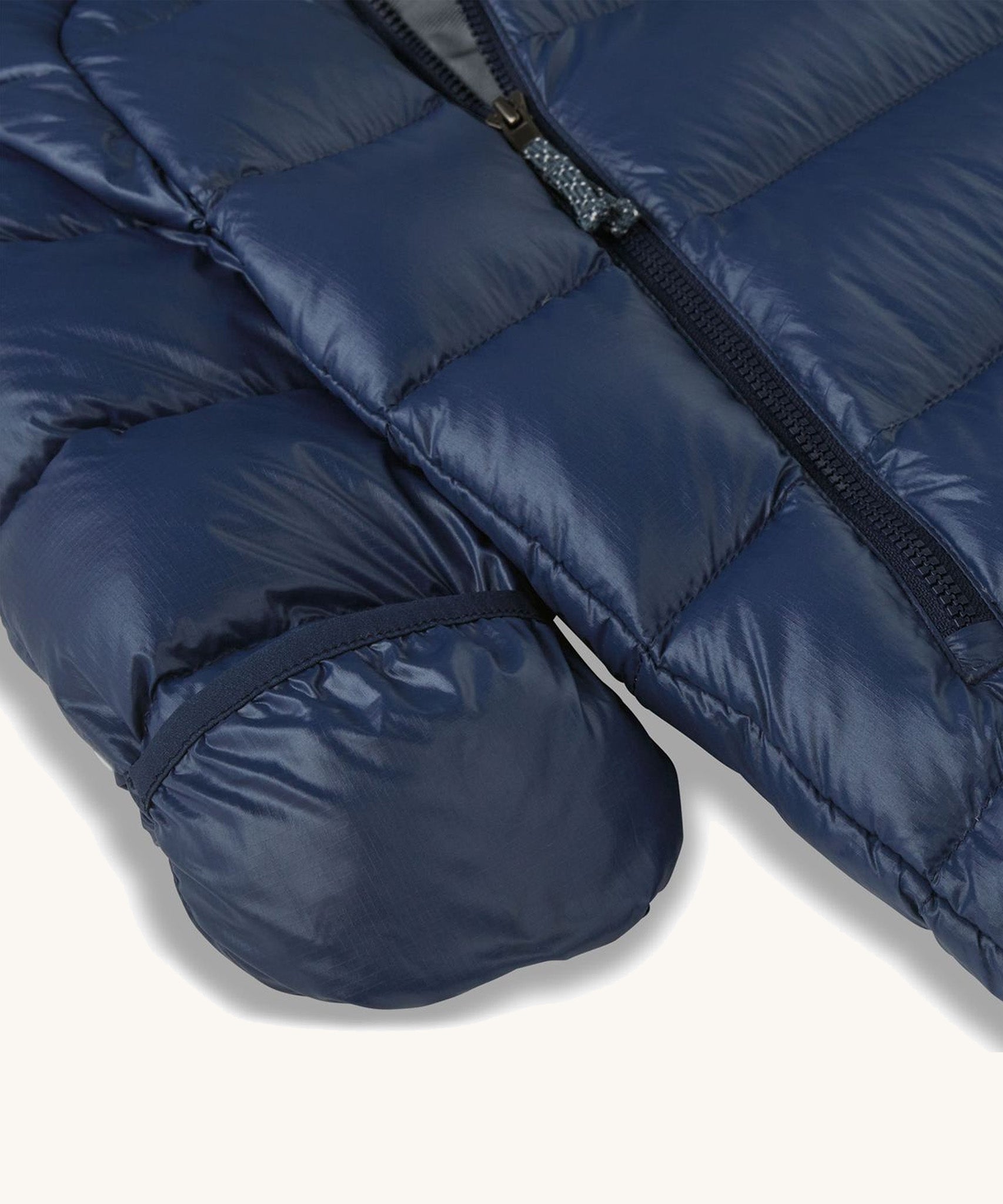 Patagonia little kids hi-loft down sweater bunting snow suit in navy showing close up of fold over mitt cover
