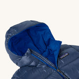 Patagonia little kids hi-loft down sweater hoody jacket in navy showing close up of the front zip detail and blue inner liner