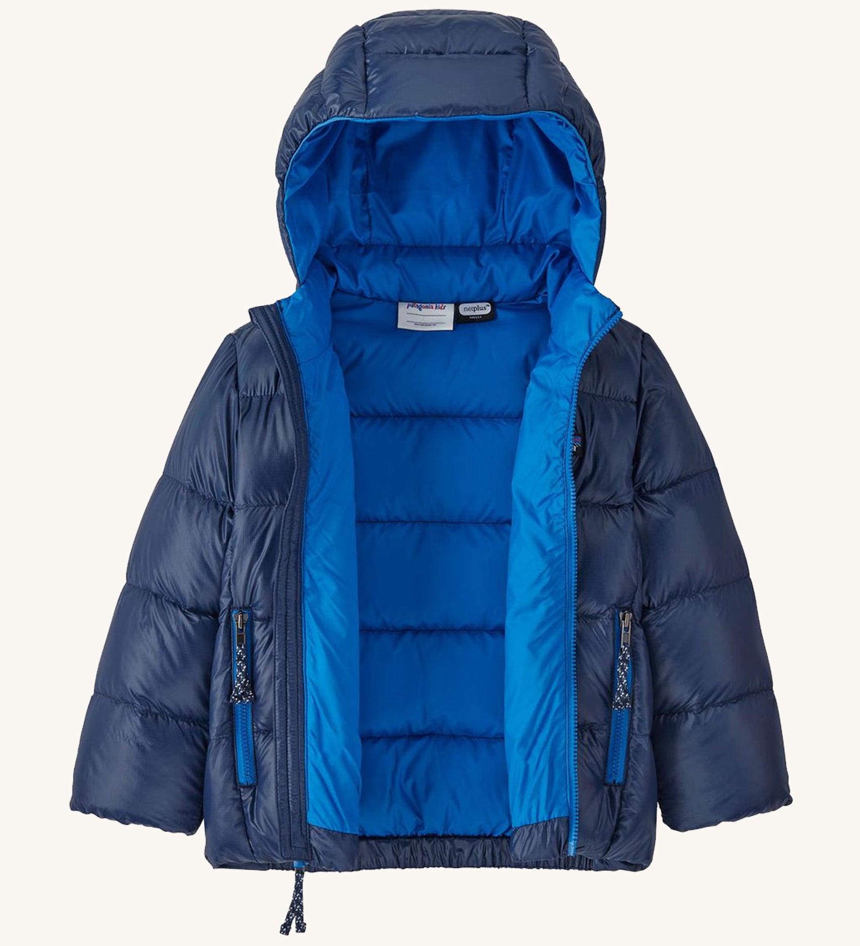An open Patagonia little kids hi-loft down sweater hoody jacket in navy showing the blue inner and quilt through construction stitching. 