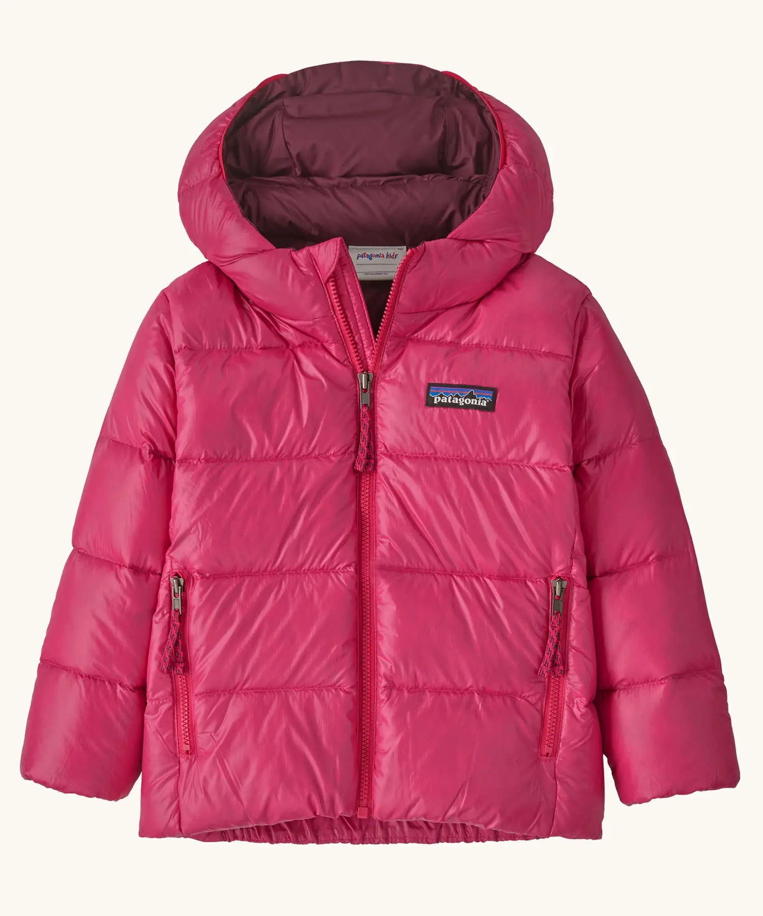 Patagonia little kids hi-loft down sweater hoody jacket in bright pink with purple inner liner. Features a full length zip and side zip pockets