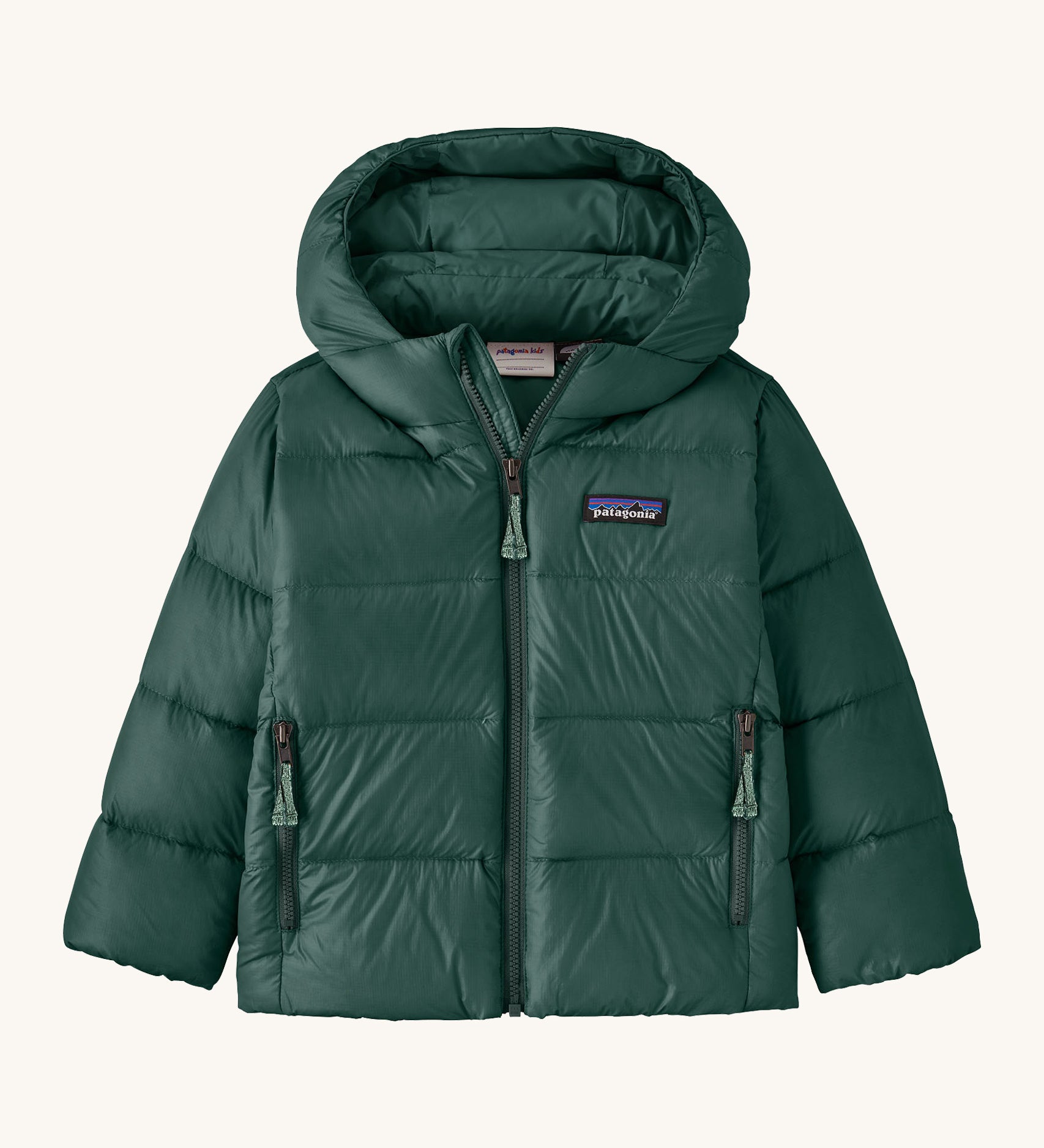 Patagonia little kids hi-loft down sweater hoody jacket in cascade green available at Babipur. A warm down hooded jacket in dark green. Feeatures a full length zip fastener and side zip pockets