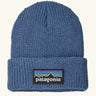 Patagonia little kids knitted beanie in barnacle blue with brand patch on brim. Made from 100% recycled polyester yarn