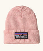 Patagonia little kids knitted beanie in sunlit pink with brand patch on brim. Made from 100% recycled polyester yarn