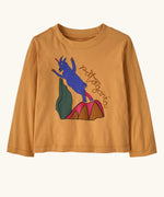 Patagonia 100% organic cotton little kids long sleeve t-shirt in mango orange with a blue mountain goat print on the front. 
