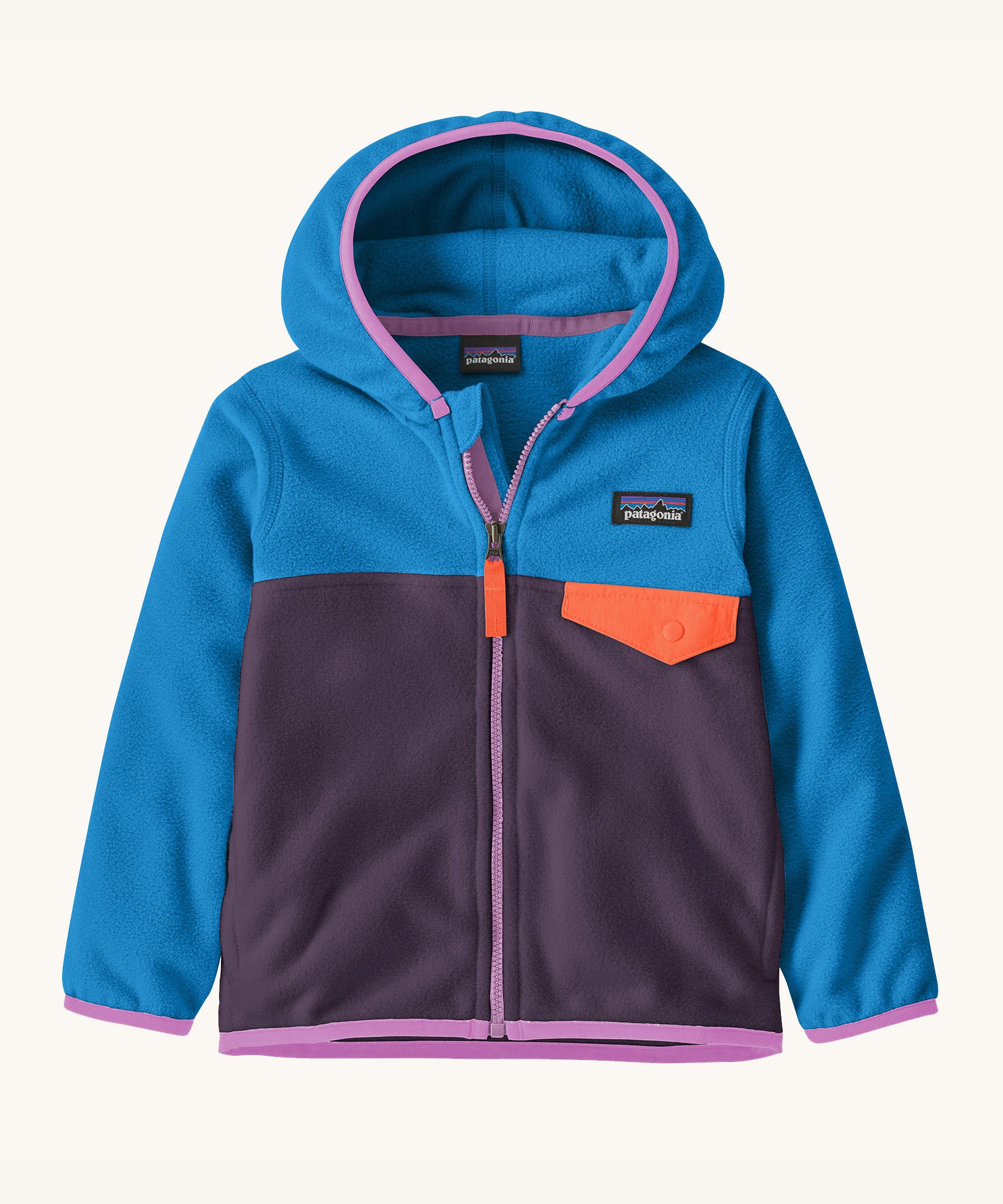 Patagonia little kids micro d snap t jacket in plummet purple available at Babipur. A 100% recycled polyester soft fleece hooded jacket in blue and purple with pink trim. Features a full length zip and small chest pocket with a orange flap