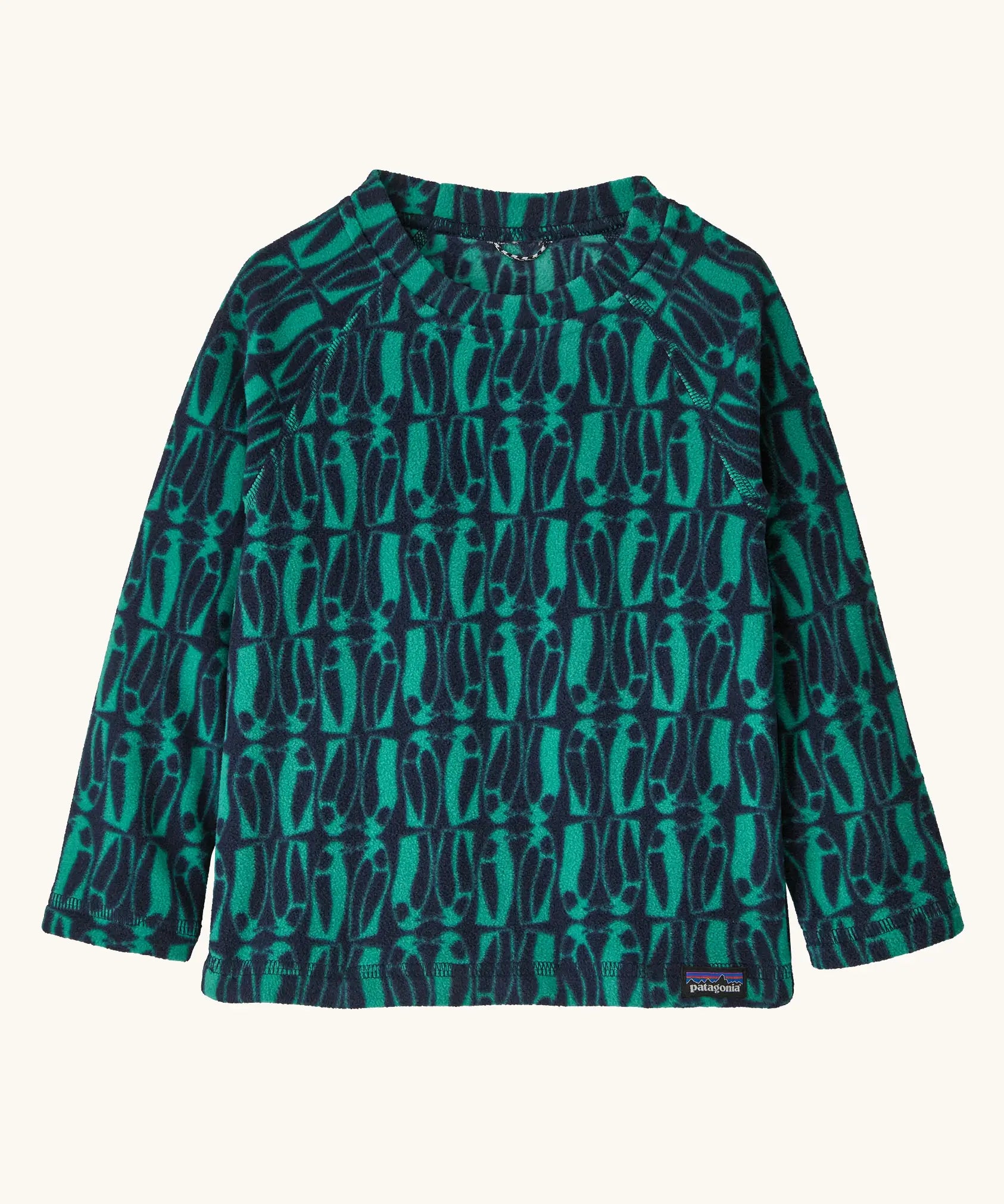 Patagonia 100% recycled polyester little kids micro d pullover jumper in navy with a repeating teal penguin design