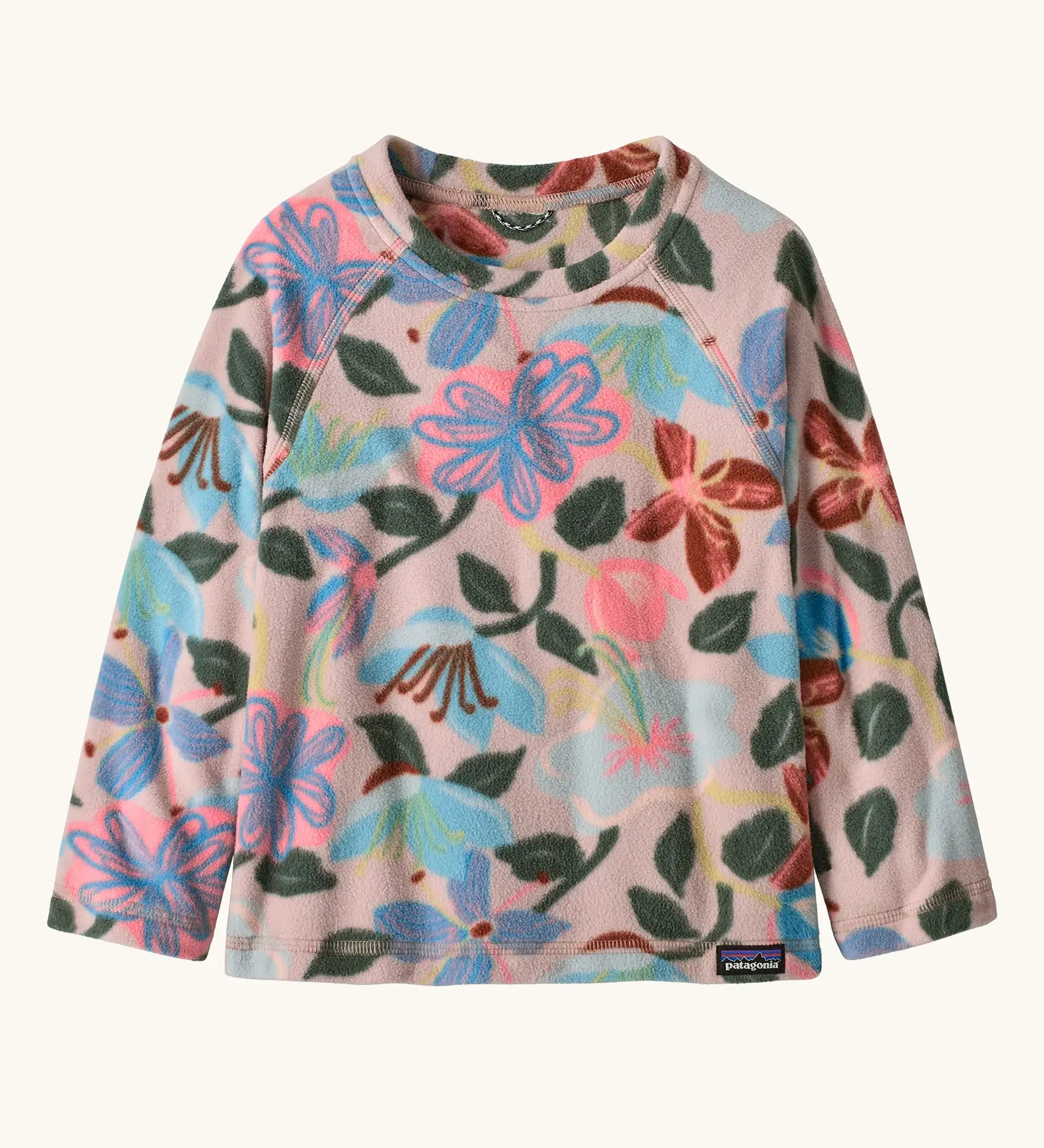 Patagonia 100% recycled polyester little kids micro d pullover jumper in pale pink with a repeating retro floral design