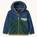 Patagonia little kids micro d snap t jacket in cascade green available at Babipur. A 100% recycled polyester soft fleece hooded jacket in dark navy and green with dark yellow trim. Features a full length zip and small chest pocket with a green flap