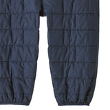 Patagonia kids nano puffer winter overalls in navy available at Babipur  showing the leg cuff detail.