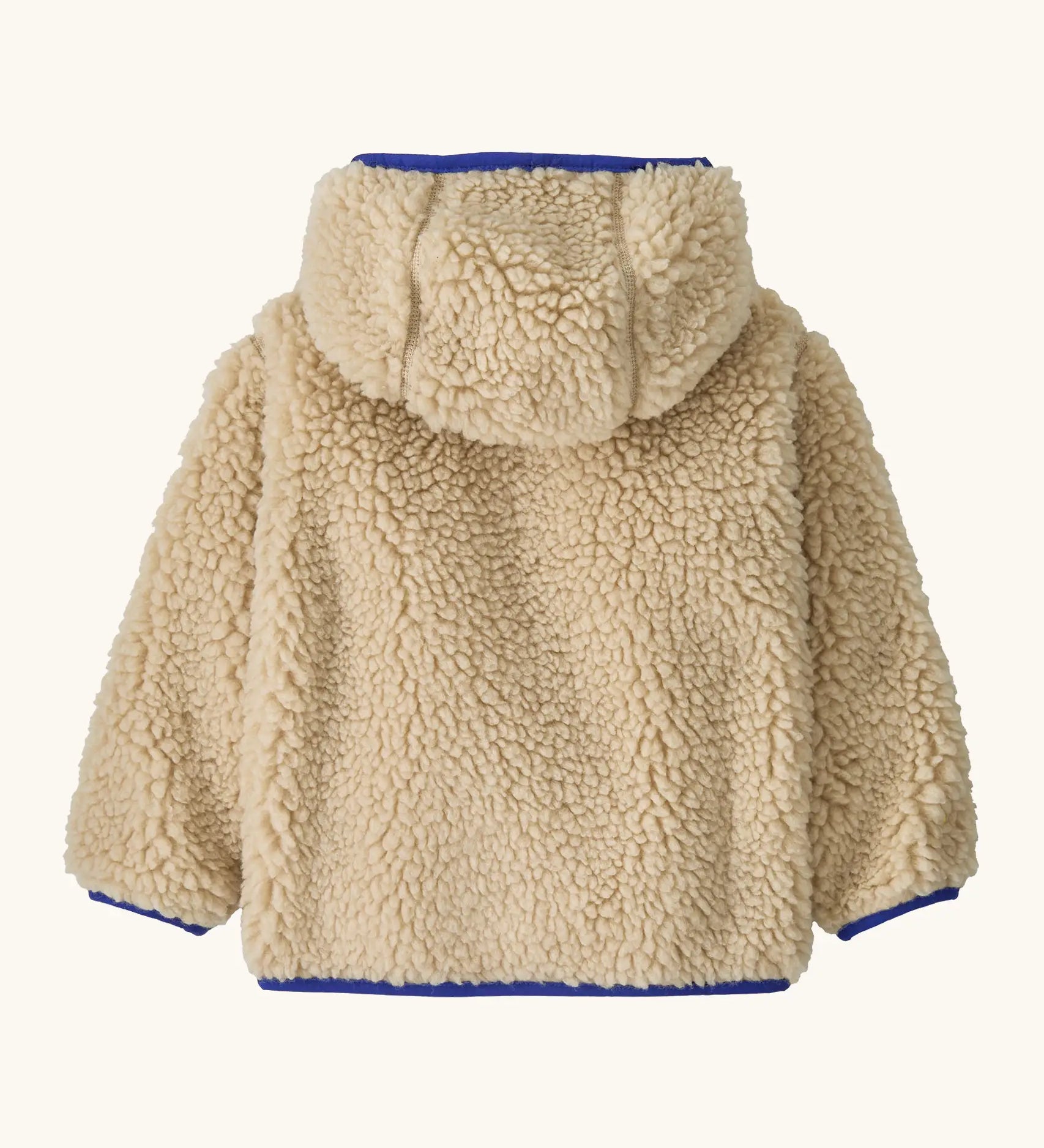 Back of Patagonia little kids retro x pile fleece hooded jacket in beige showing a blue trim on the cuff and hem