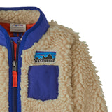 Patagonia little kids retro x jacket in dark natural available at Babipur showing the zip and chest pocket detail