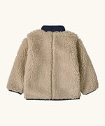 Back of Patagonia little kids retro x pile fleece jacket in neutral with a navy turned up collar