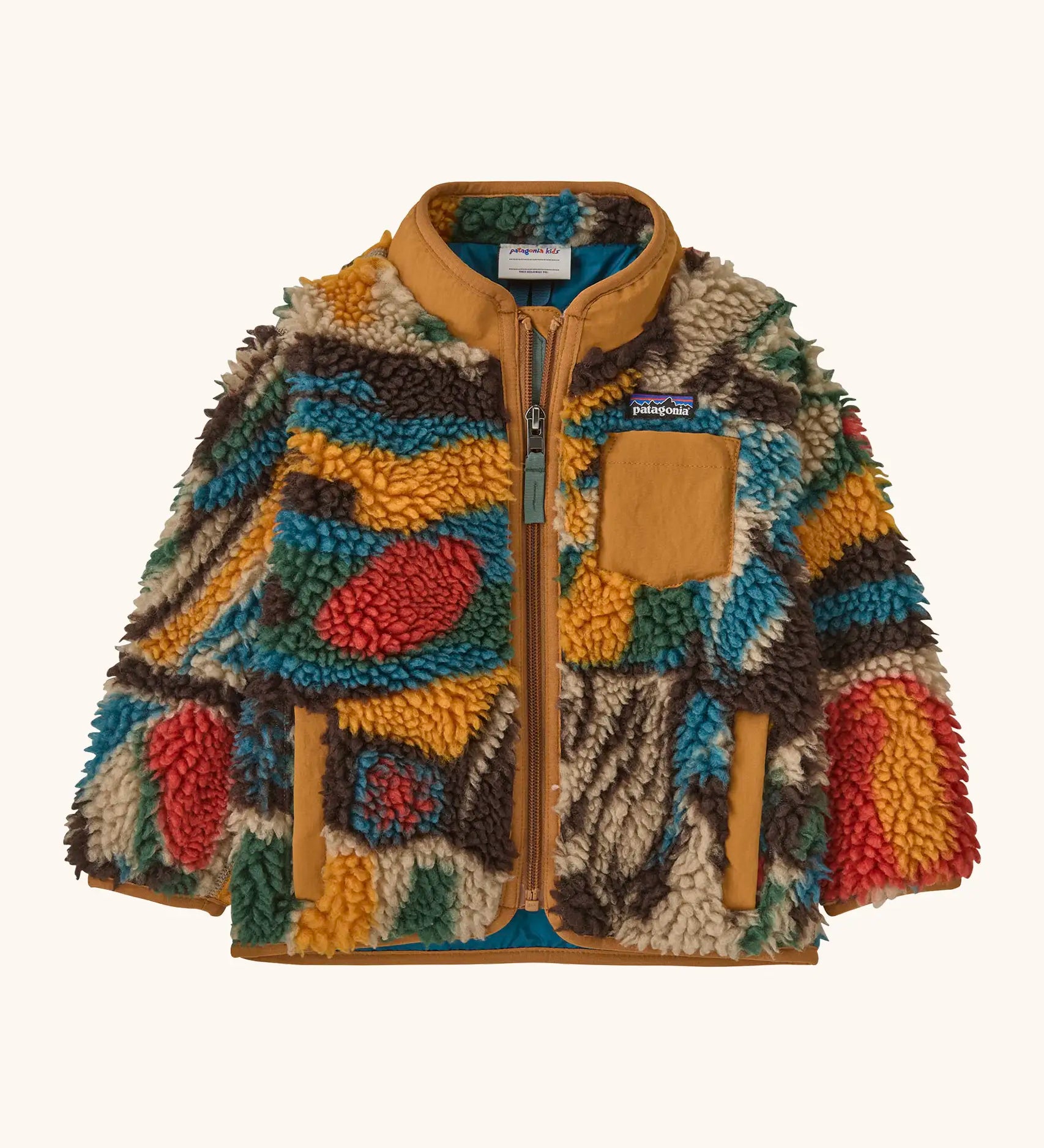 Patagonia little kids retro x pile fleece jacket with a colourful pattern and brown trim. Shows a full front zip, side and chest pockets