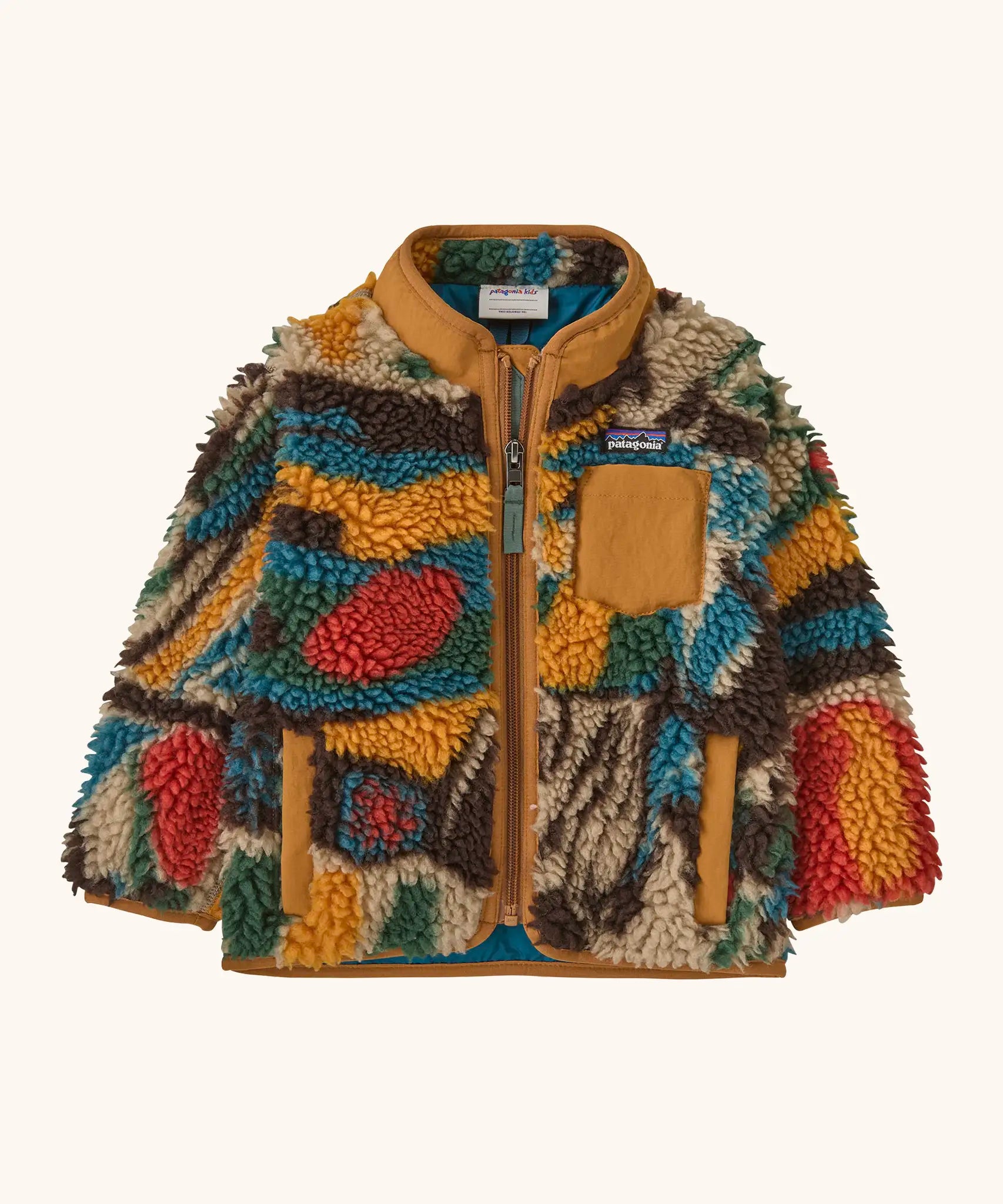 Patagonia little kids retro x pile fleece jacket with a colourful pattern and brown trim. Shows a full front zip, side and chest pockets