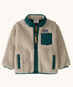 Patagonia little kids retro x jacket in dark natural/cascade green available at Babipur. A 100% recycled polyester and pile fleece jacket in cream with dark green trim. Features a full length zip, 2 side pockets and a chest pocket