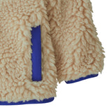 Patagonia little kids retro x jacket in dark natural available at Babipur showing the side pocket and cuff detail