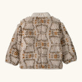 Back of Patagonia little kids retro x pile fleece jacket in warm brown pattern with a neutral turn up collar 