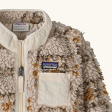 Patagonia little kids retro x pile fleece jacket in warm brown pattern showing a close up of the neutral turn up collar and chest pocket