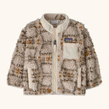 Patagonia little kids retro x pile fleece jacket in neutral with a warm brown pattern. Shows a full front zip, side and chest pockets