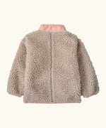 Back of Patagonia little kids retro x pile fleece jacket in neutral with a pink turn up collar 