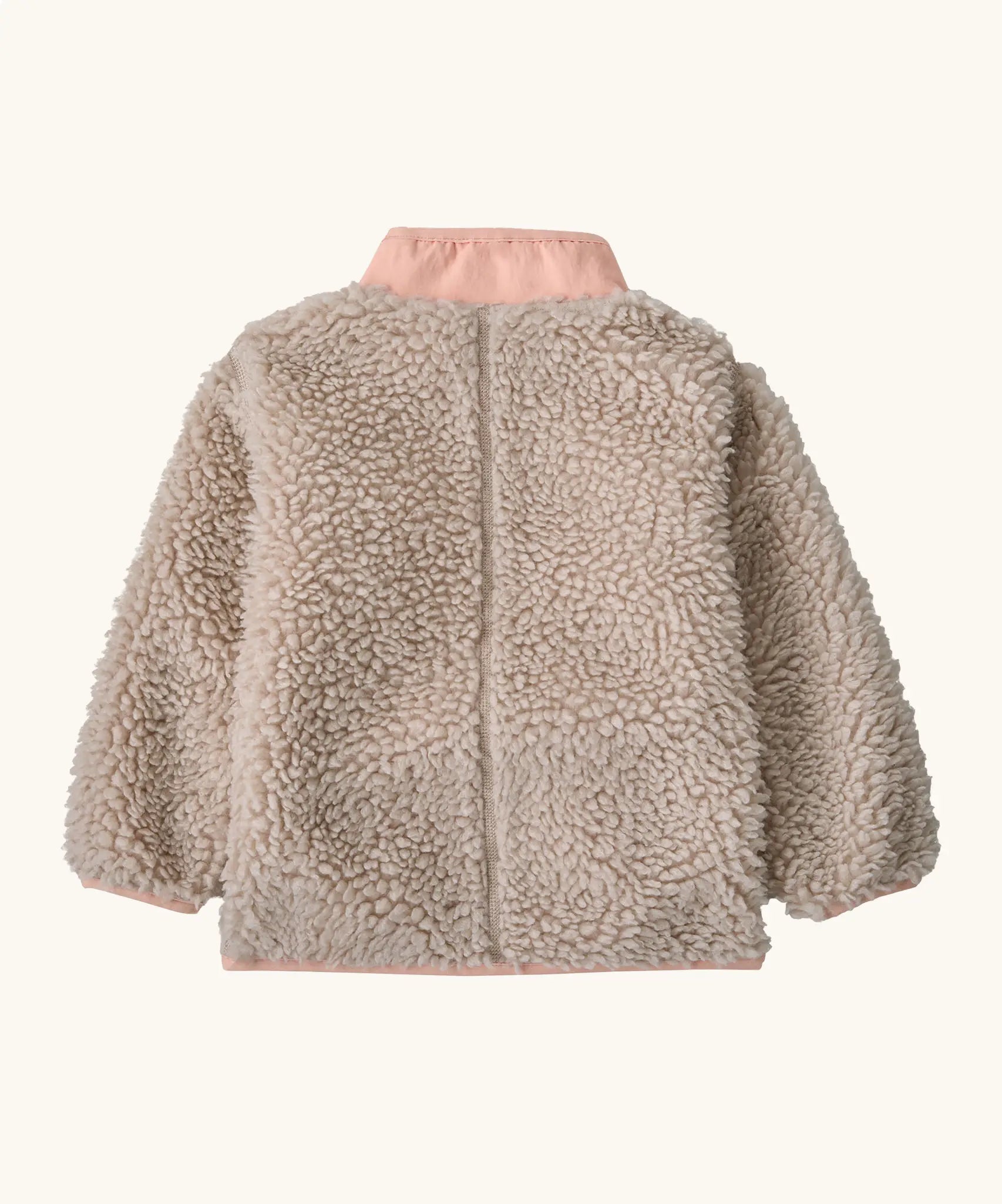 Back of Patagonia little kids retro x pile fleece jacket in neutral with a pink turn up collar 