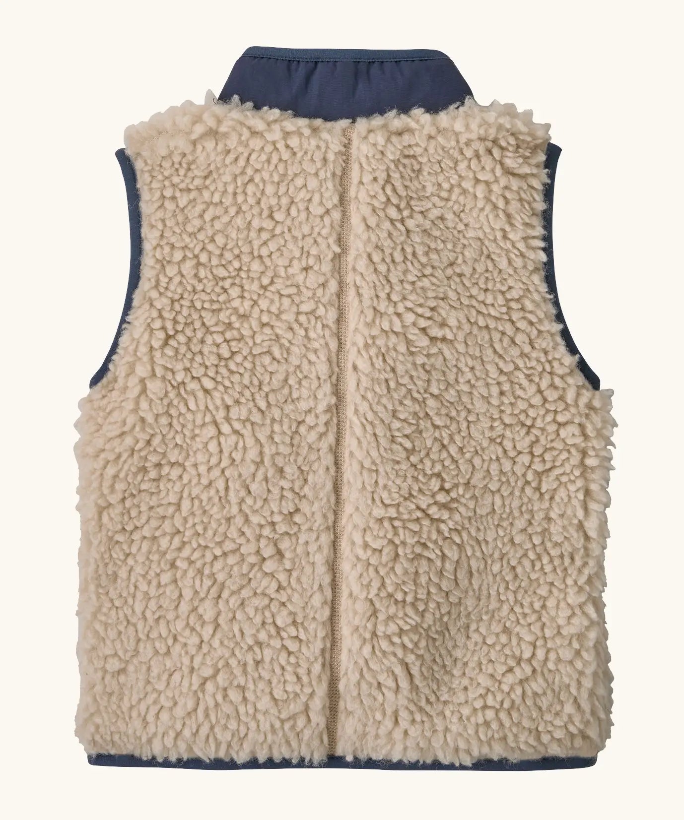 Back of Patagonia 100% recycled polyester little kids retro x high pile fleece vest in beige with a navy turned up collar 