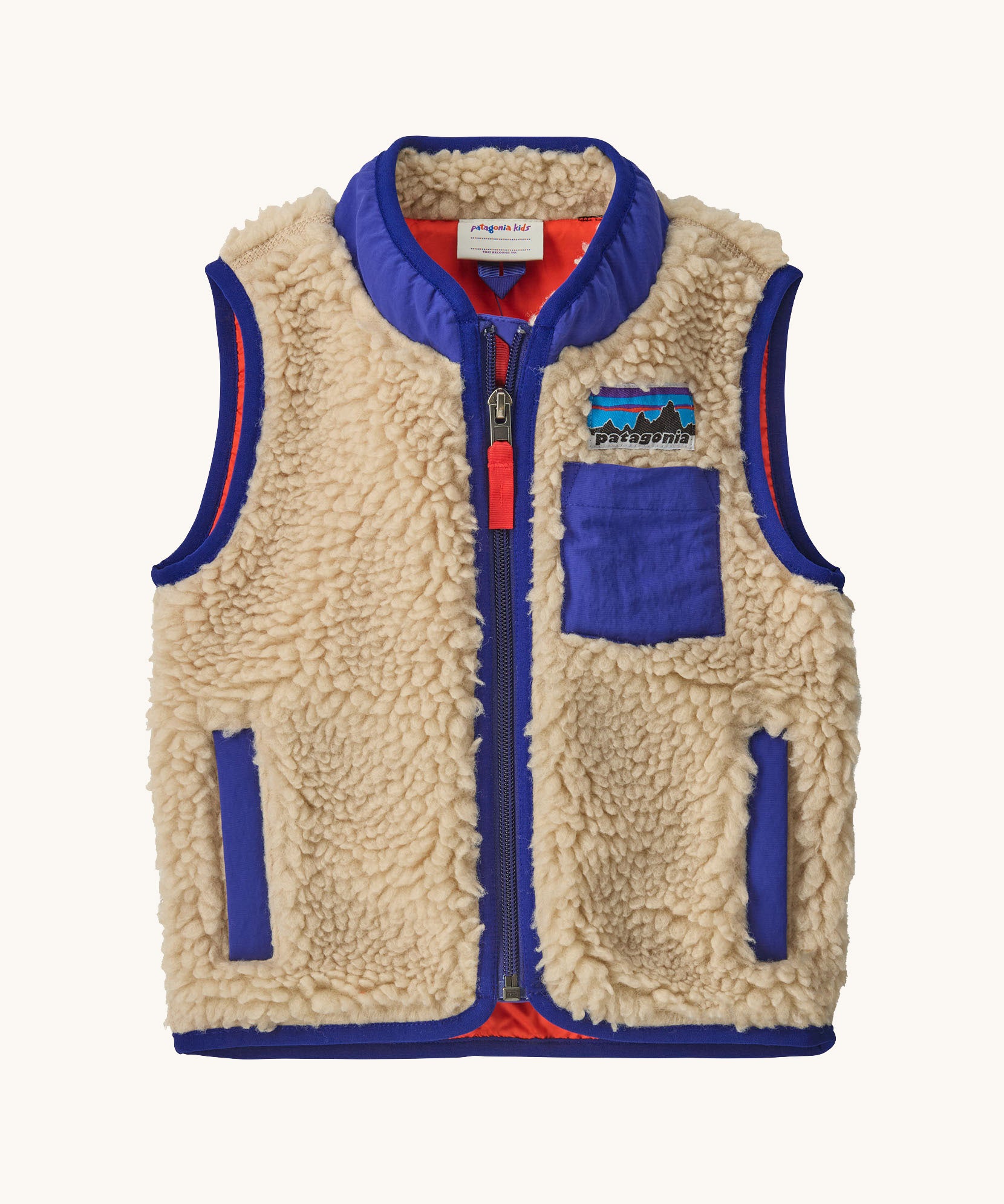 Patagonia little kids retro x vest in dark natural available at Babipur. A 100% recycled polyester and pile fleece gilet with dark blue trim. Features a full length zip, 2 side pockets and a small chest pocket