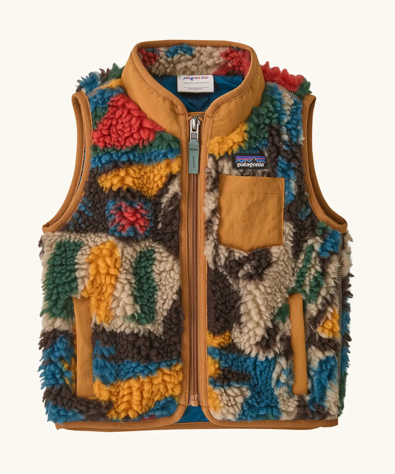 Patagonia 100% recycled polyester little kids retro x high pile fleece vest with abstract design and brown trim. Features a full length zip, side and chest pockets 