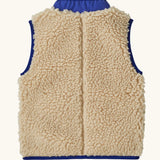 Back of Patagonia's little kids retro x high pile fleece vest in beige showing coloured hem trim and stand up collar