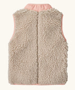 Back of Patagonia 100% recycled polyester little kids retro x high pile fleece vest in beige with a pink turn up collar 