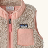 Patagonia 100% recycled polyester little kids retro x high pile fleece vest in beige   with showing close up of a pink turn up collar and chest pocket