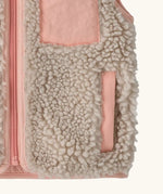 Patagonia 100% recycled polyester little kids retro x high pile fleece vest in beige   with showing close up of a side pocket with pink trim