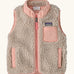 Patagonia 100% recycled polyester little kids retro x high pile fleece vest in beige   with pink trim. Features a full length zip, side and chest pockets 