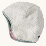 Patagonia recycled polyester baby cosy reversible beanie hat in hope blooms/fuzzy mauve showing a white fleece pile 