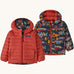 Patagonia Kids Reversible Down Hoody in salon energy/ink black design side by side showing the different colour and print detail.