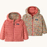 Patagonia Kids Reversible Down Hoody in tiny world/lichen green design side by side showing the different colour and print detail.