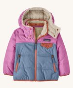 Patagonia little kids tribbles hoody available at Babipur. A reversible coat showing a blue and pink hooded coat and natural fleece inner for warmth. Features a small chest pocket with popper fastening and 2 side zip pockets