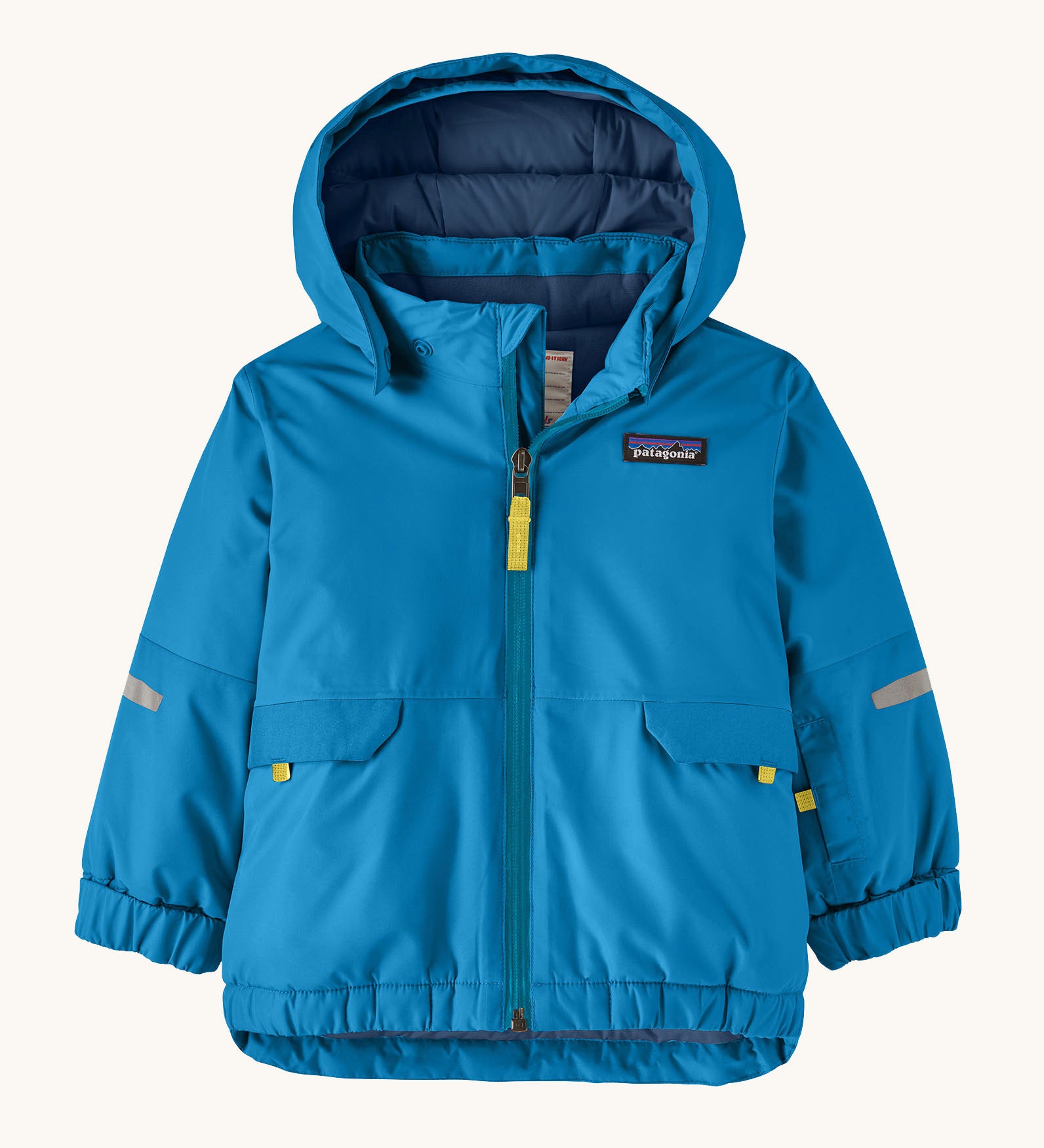Patagonia little kids snow pile jacket in uplift blue available at Babipur. A 100% recycled polyester thick winter hooded hooded. Features a full length zip, side pocket and elasticated cuffs.