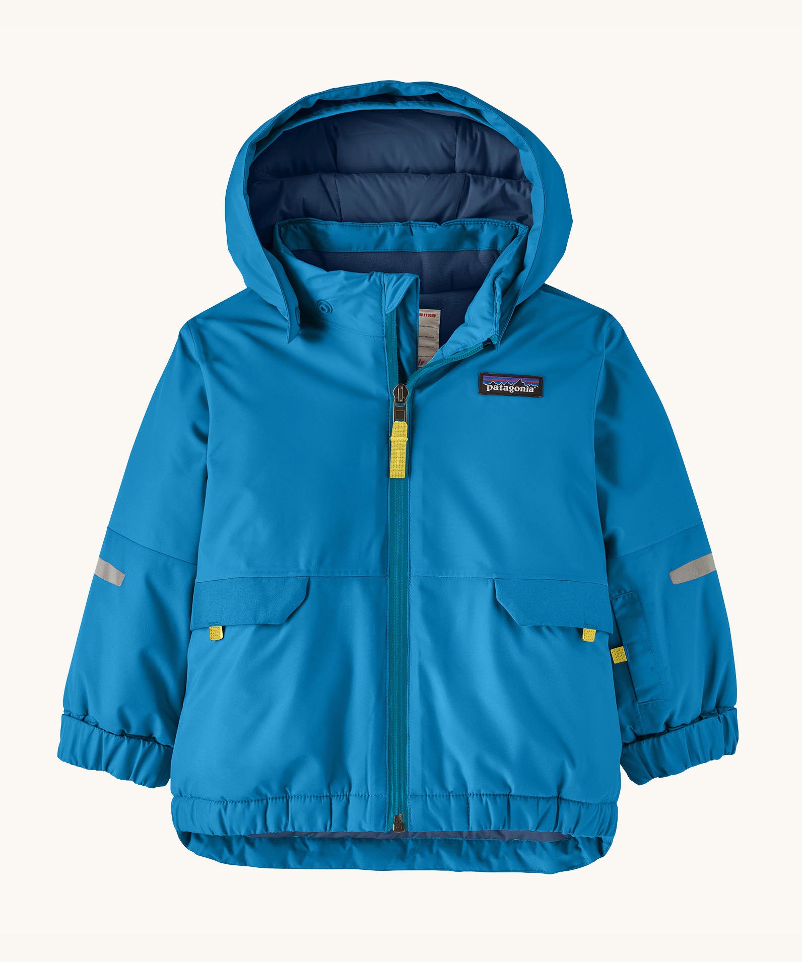 Patagonia little kids snow pile jacket in uplift blue available at Babipur. A 100% recycled polyester thick winter hooded hooded. Features a full length zip, side pocket and elasticated cuffs.
