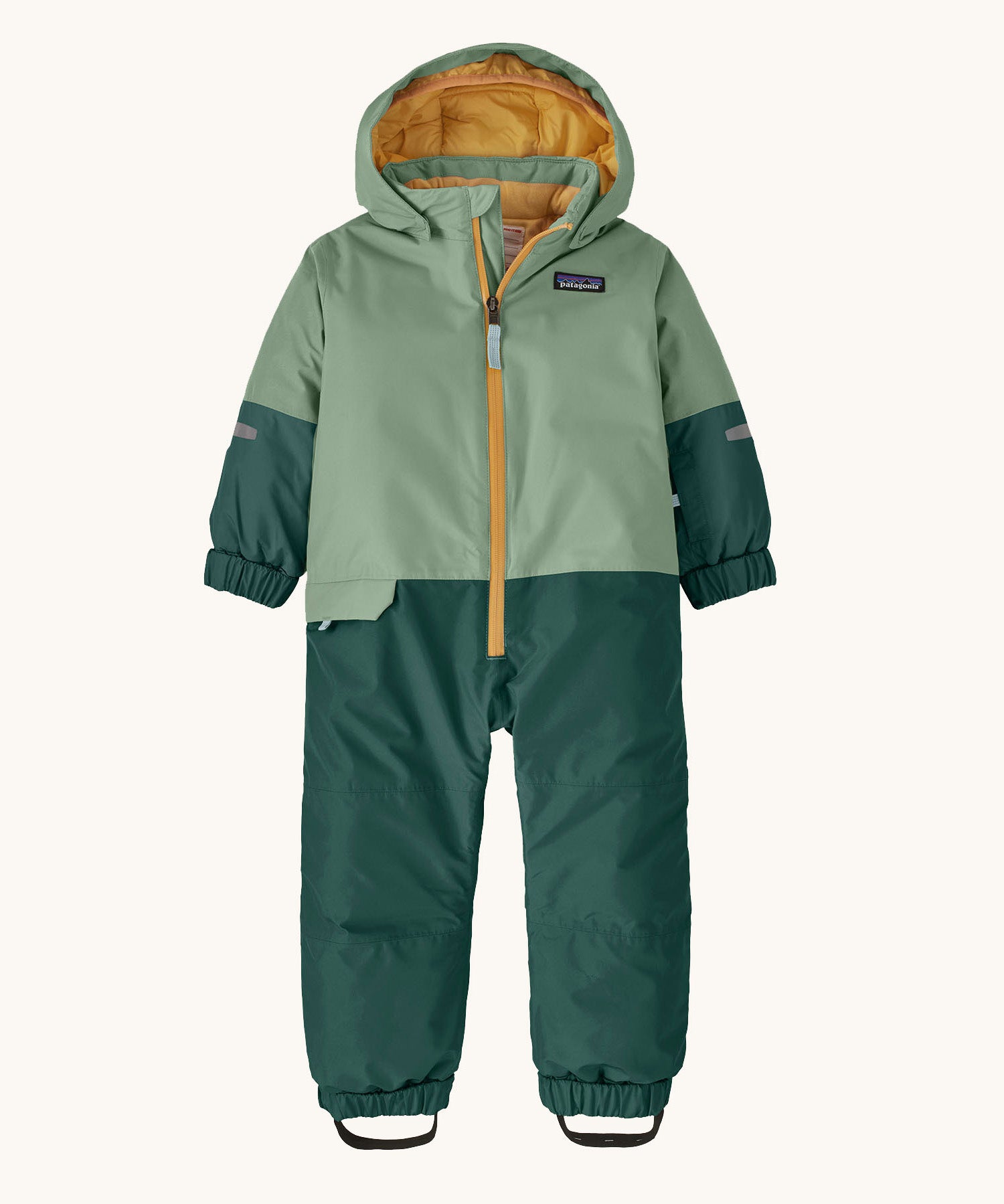 Patagonia little kids snow pile one piece in ellwood green available at Babipur. A 100% recycled polyester thick all in one suit in light and dark green. Features elasticated cuffs and band for a secure fit