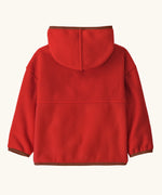 Back of Patagonia little kids synchilla hoody in Amanita red. 100% recycled polyester hooded jacket in red with a regular fit