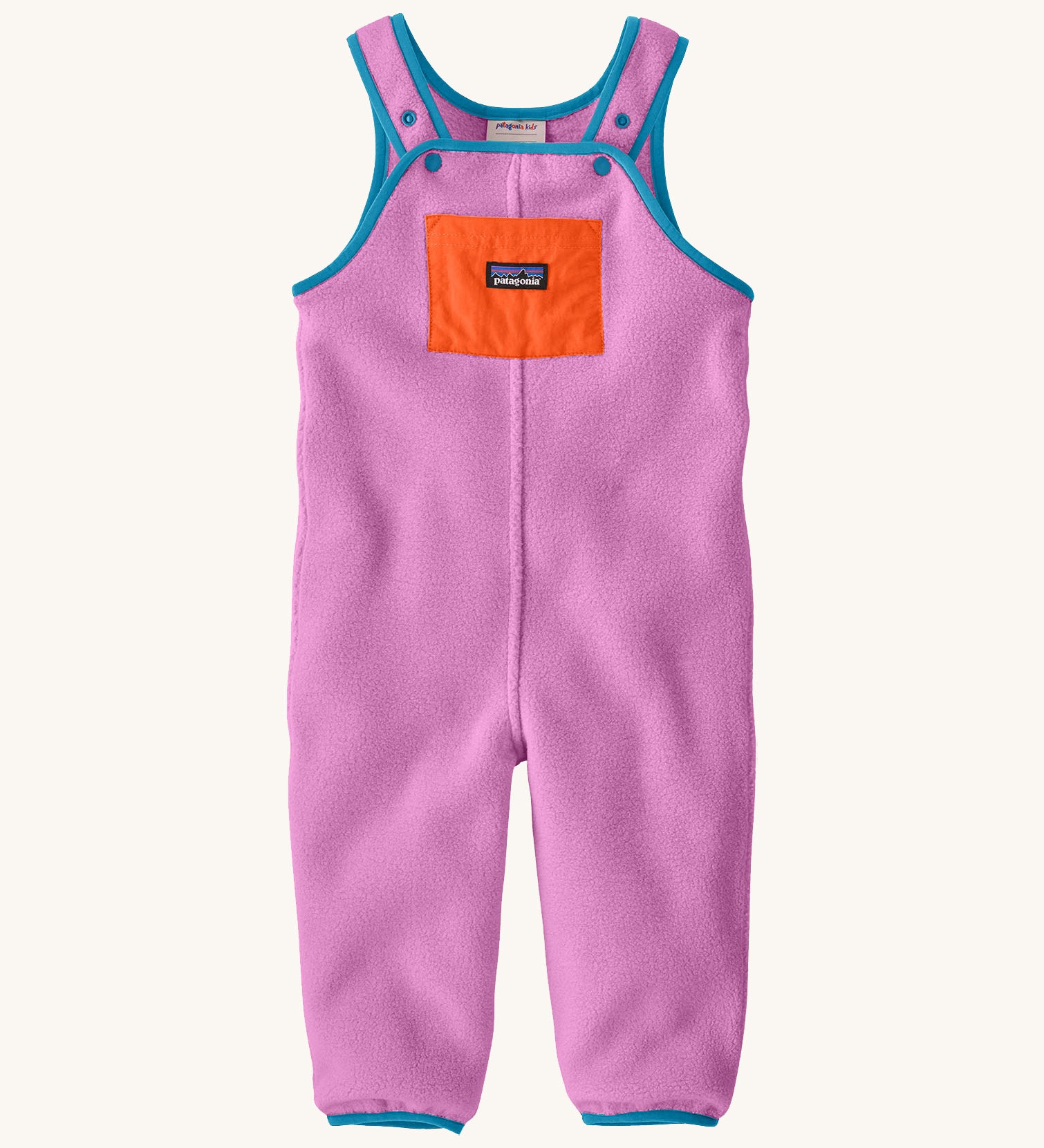 Patagonia little kids synchilla fleece dungarees in brisk purple available at Babipur. A 100% recycled polyester soft fleece dungarees in bright purple with blue trim. Features a small front pocket in orange, elasticated leg cuffs and popper fasteners on the shoulder straps