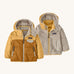 Patagonia little kids tribbles hoody. A reversible coat showing a dark and light yellow hooded coat and natural fleece alternative side. Features a small chest pocket and side pockets
