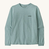 Patagonia women's outline responsibili top available at Babipur. A blue, long sleeve t-shirt showing the brand text printed on the chest