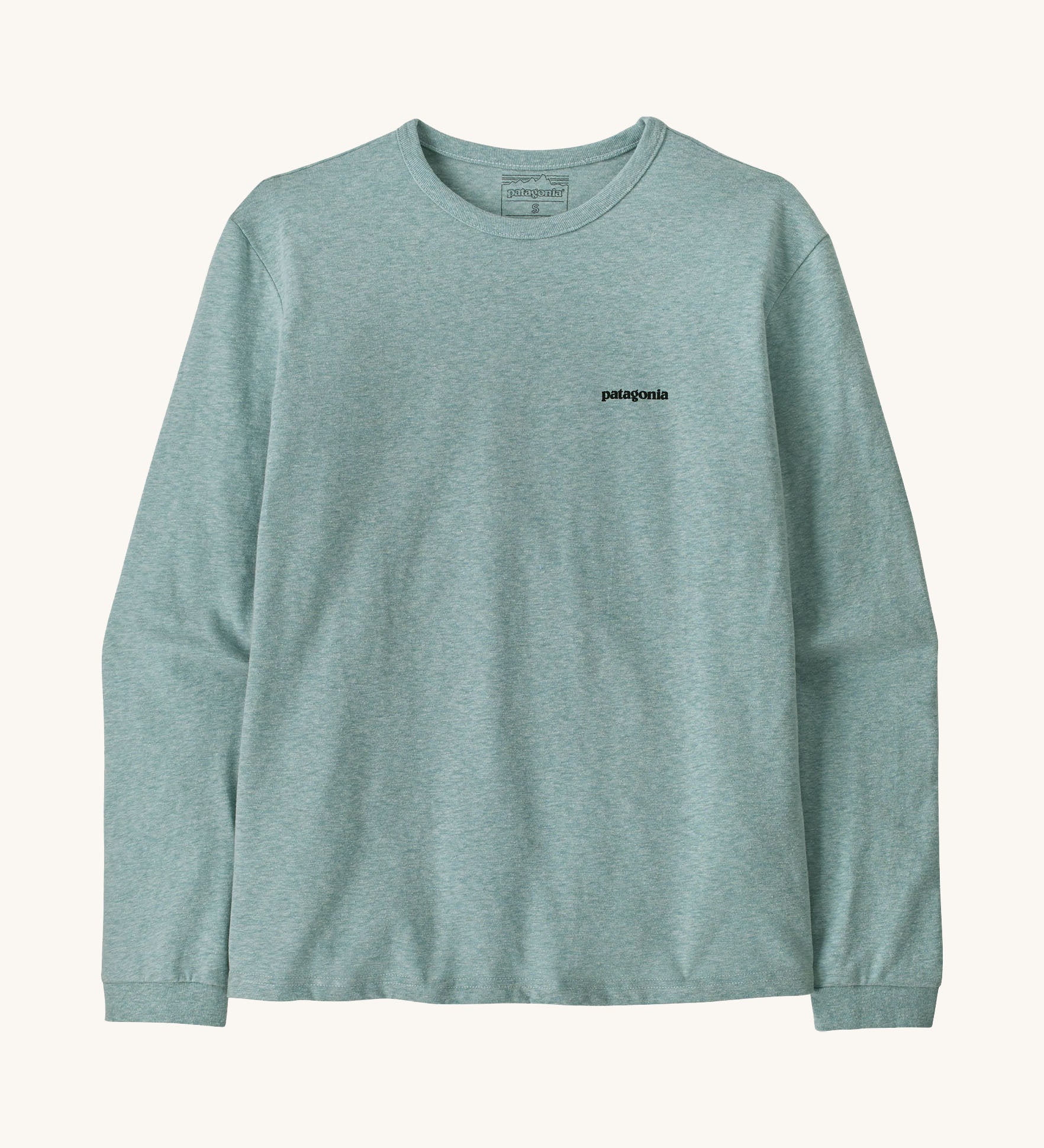Patagonia women's outline responsibili top available at Babipur. A blue, long sleeve t-shirt showing the brand text printed on the chest