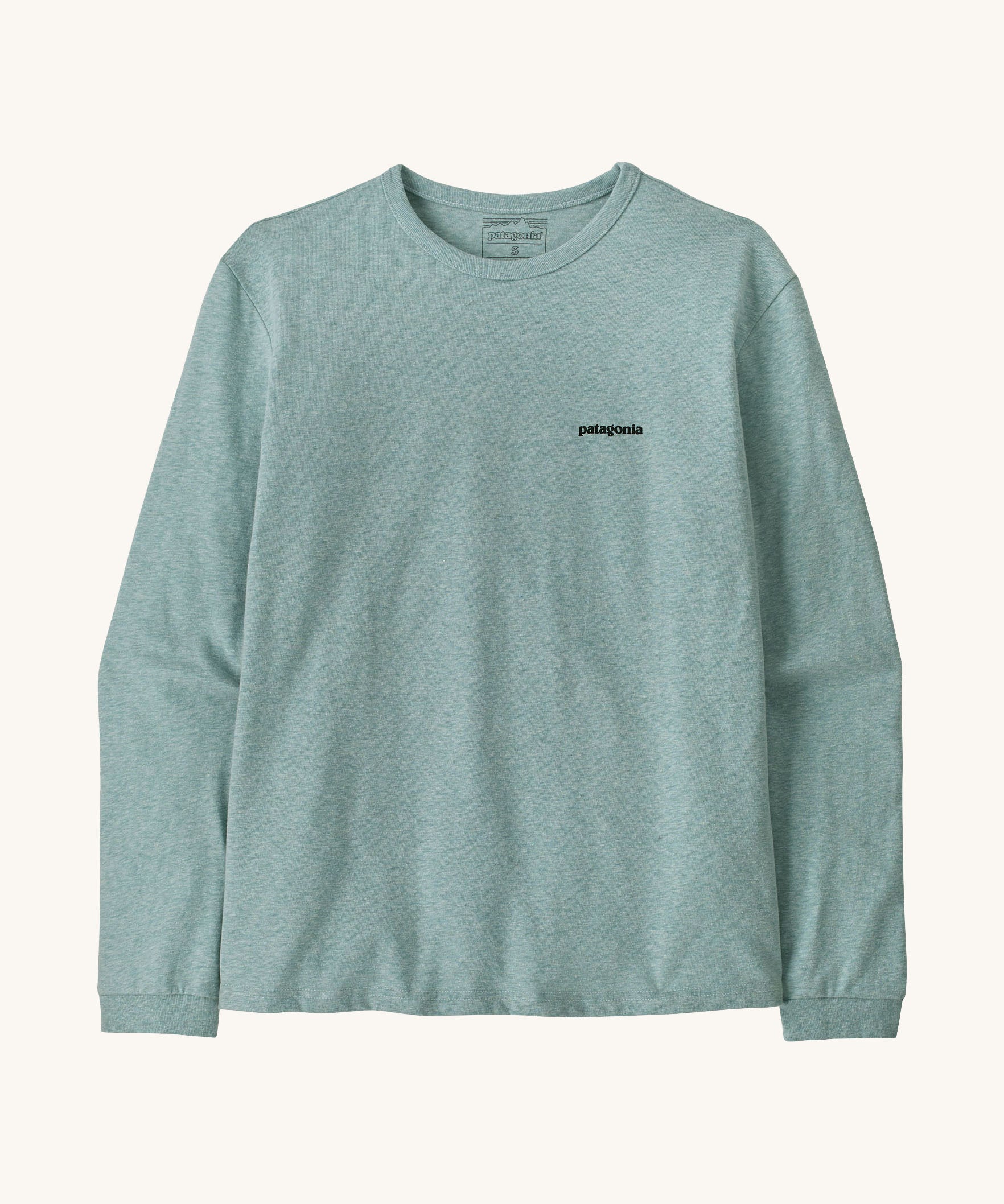Patagonia women's outline responsibili top available at Babipur. A blue, long sleeve t-shirt showing the brand text printed on the chest