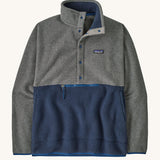 Patagonia Men's fleece pullover in grey and dark blue lower body. Features a 3/4 length front popper and a zipped pouch pocket .