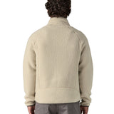 The back of the A man wearing the the Patagonia Men's Retro Pile Fleece Jacket in a Pelican colour available at Babipur and worn by a man