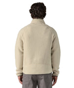 The back of the A man wearing the the Patagonia Men's Retro Pile Fleece Jacket in a Pelican colour available at Babipur and worn by a man